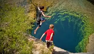 The Jacob's Well in Texas, a natural well that attracts divers