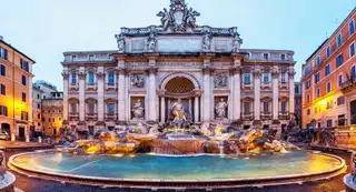 Where are the pieces thrown into the Trevi Fountain in Rome?