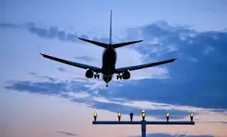 How many tons of CO2 emits your flight by plane?