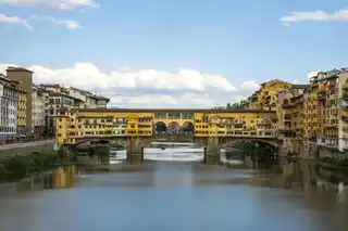 Visit Ponte Vecchio, the most famous bridge in Florence