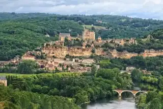 In which village house in the Périgord?