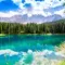 The Lake of Carezza in Italy: Alpine decor and rainbow fresco